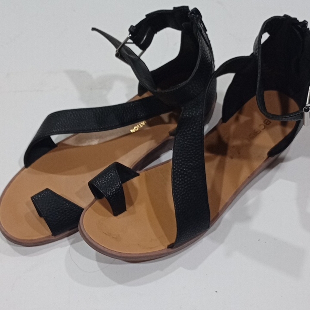 BCBGeneration Black and Tan Sandals with Crisscross Straps